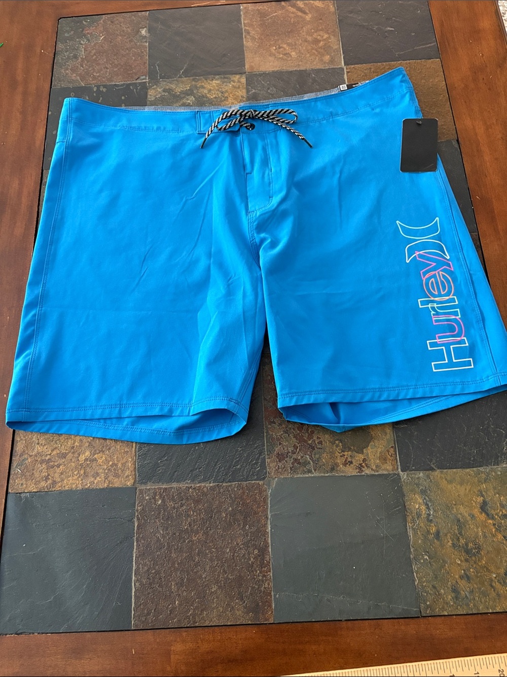NWT Hurley Men’s Bright Cyan Board Shorts with Side Logo size 40.